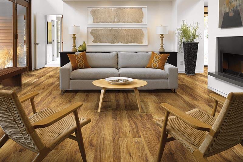 Modern living room with new floor and brown color scheme | The L&L Company