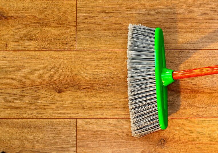 HardwoodRoutineCare Sweeping hardwood flooring | The L&L Company