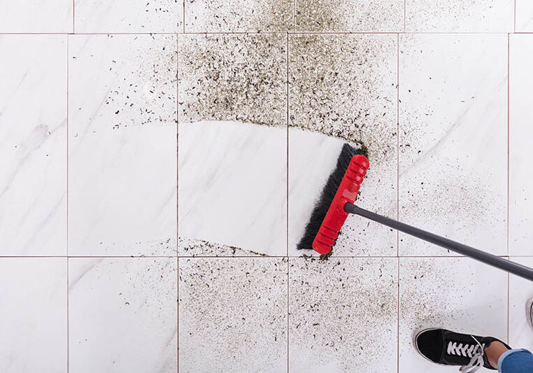 Sweeping Tile Floor | The L&L Company